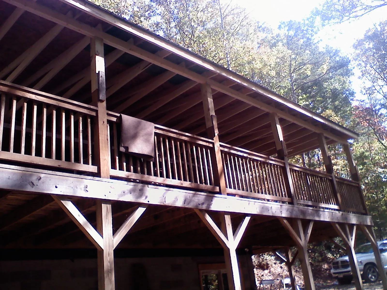 Timber framing under a new elevated porch and deck — Roof Leak Repair in Boys Town by Roofing Brothers